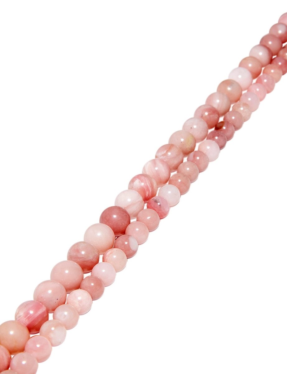 Opal Strang Natur dunkel-rosa poliert Kugeln - Shanti Enterprise AG