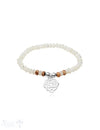 Armband mit Knoten Anhänger Silber auf Elastik 6 mm breit 18 cm lang - Shanti Enterprise AG