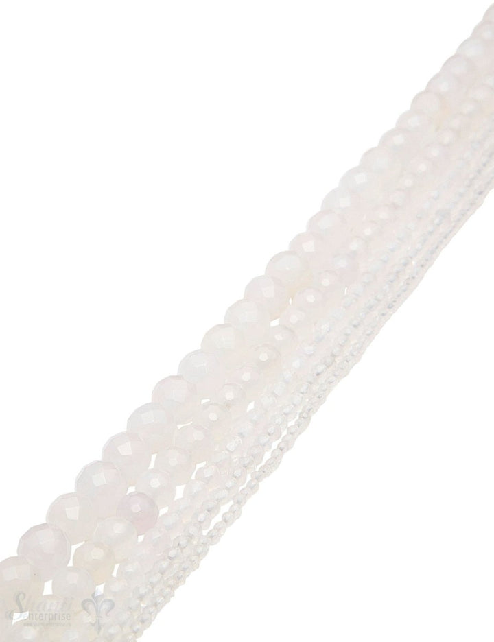 Chalcedon Strang weiss facettiert Kugeln AA - Shanti Enterprise AG