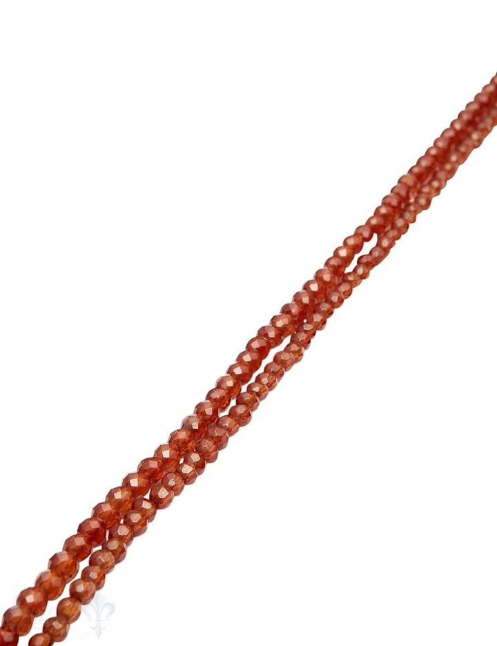 Spessartin Strang cognac-orange facettettiert Kugeln AA Granat - Shanti Enterprise AG