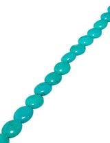 Türkis Strang oval 15x12.5 mm poliert gefärbt